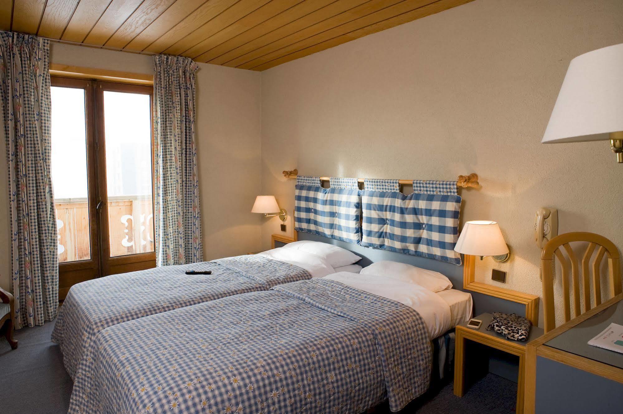 Madame Vacances Hotel Le Christina Alpe d'Huez Buitenkant foto